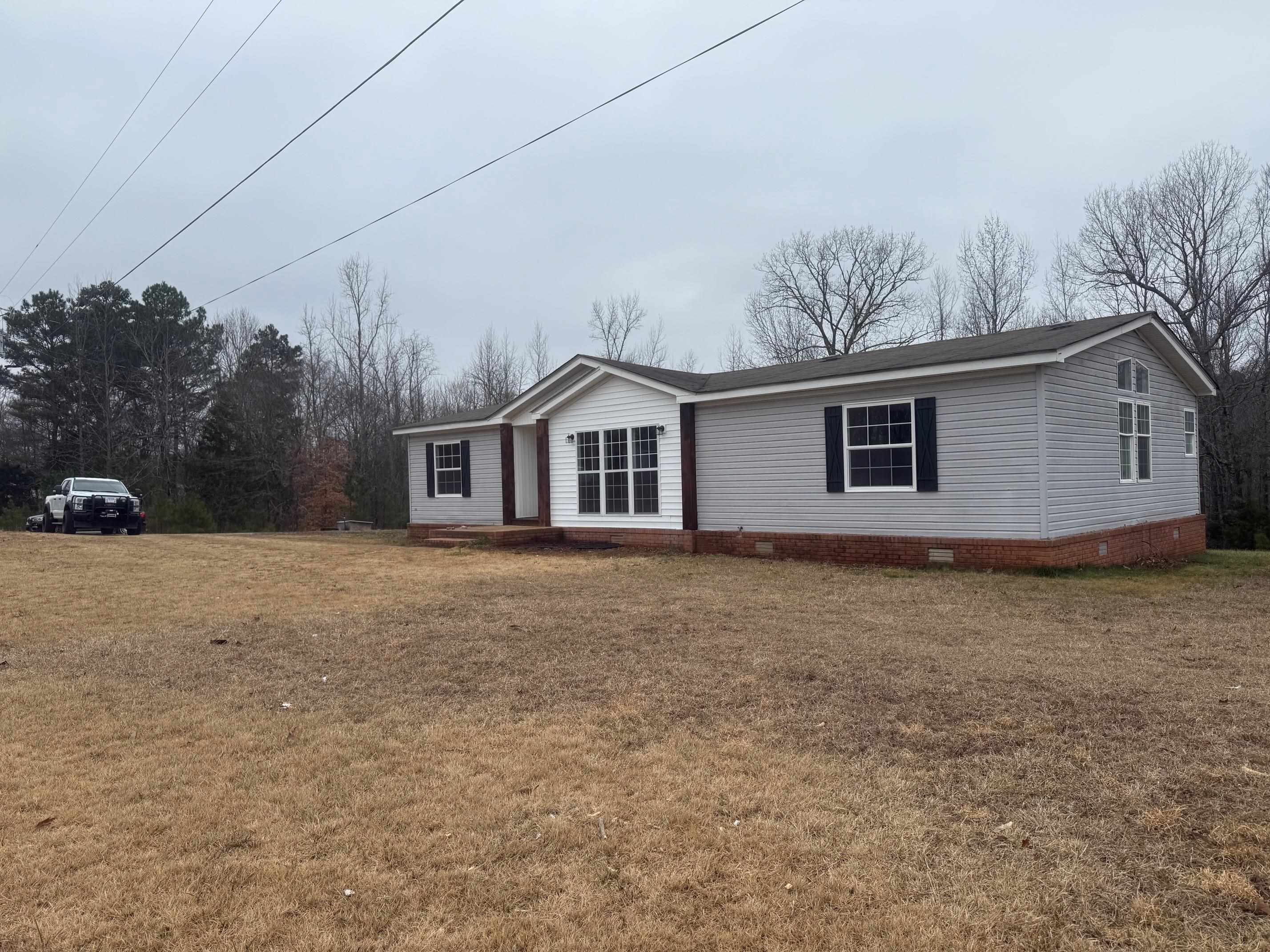 1688 Hardin Graveyard Road Adamsville, TN 38310 - Photo 36 of 40 a house view with a backyard space