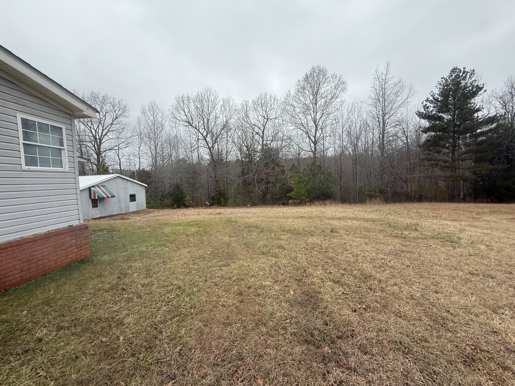 1688 Hardin Graveyard Road Adamsville, TN 38310 - Photo 38 of 40 a bathroom with a tub