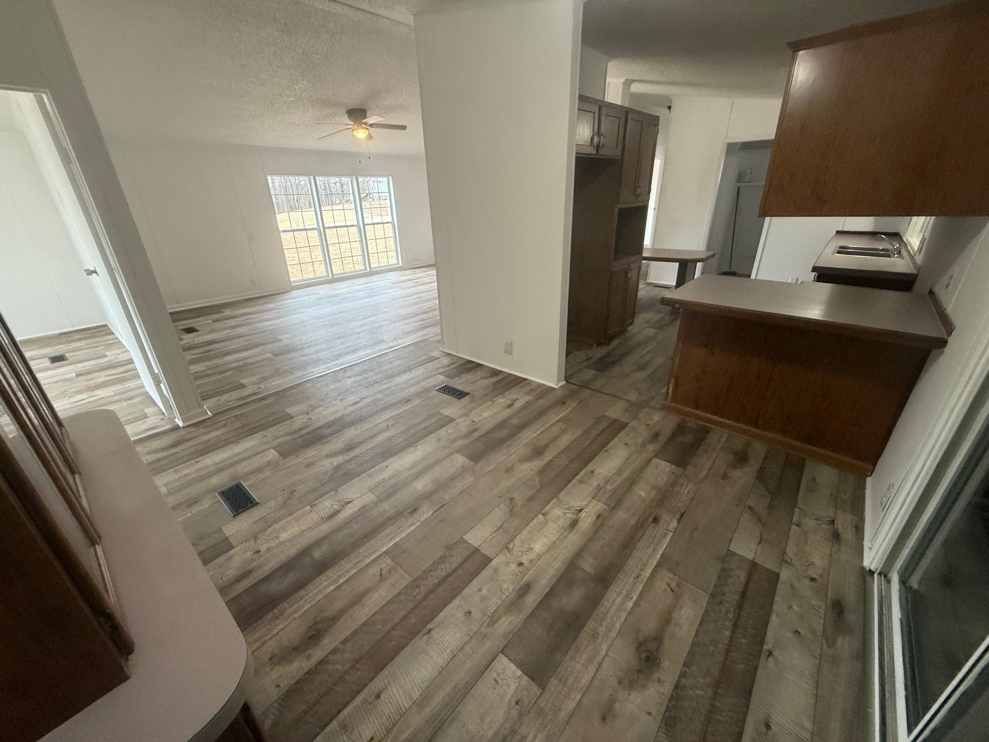 1688 Hardin Graveyard Road Adamsville, TN 38310 - Photo 9 of 40 a view of kitchen and utility room