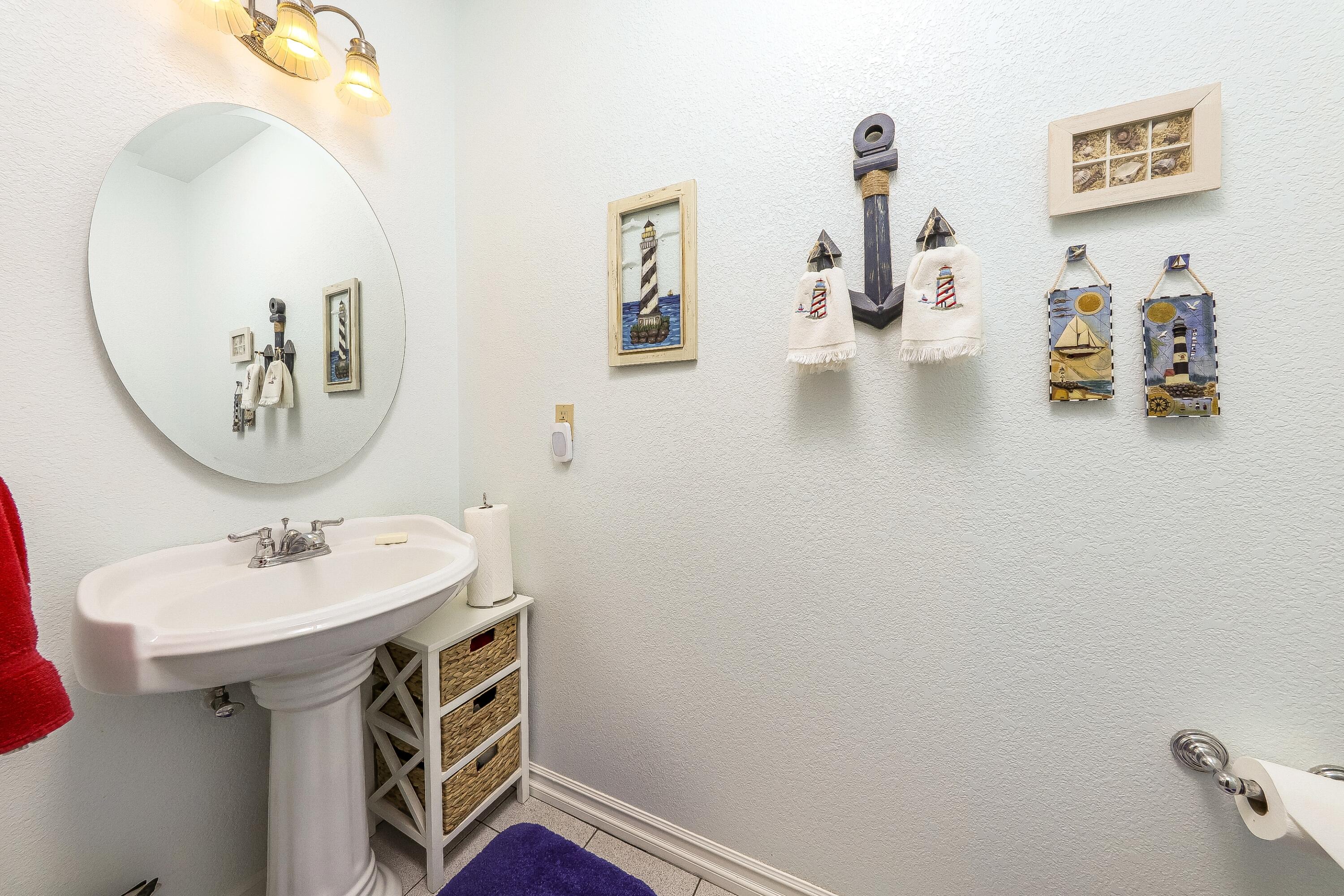 26801 Bear Valley Road Tehachapi, CA 93561 - Photo 22 of 84 a bathroom with a sink mirror and vanity