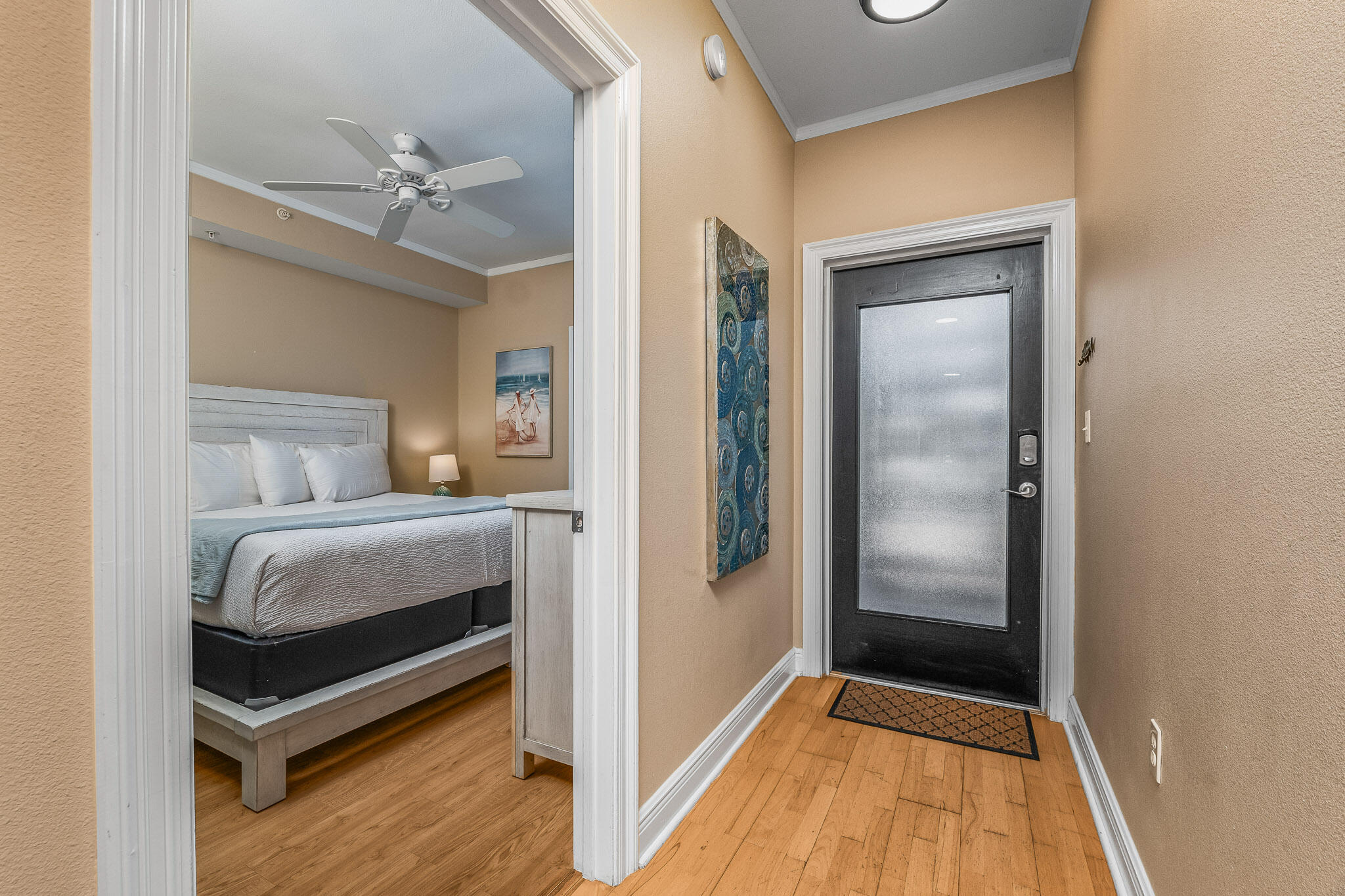 43 Cassine Way, Unit 206 Santa Rosa Beach, FL 32459 - Photo 13 of 32 a bedroom with a bed and a mirror