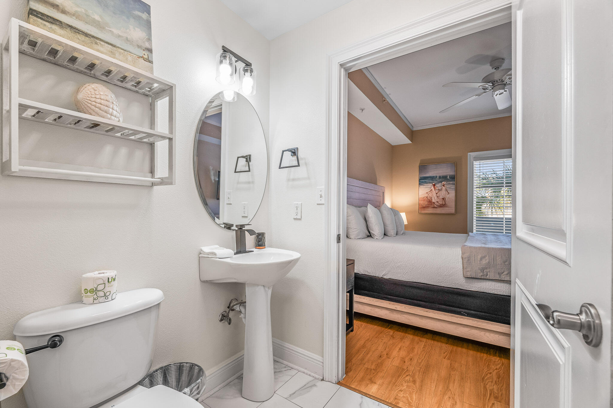 43 Cassine Way, Unit 206 Santa Rosa Beach, FL 32459 - Photo 19 of 32 a bathroom with a sink mirror and toilet
