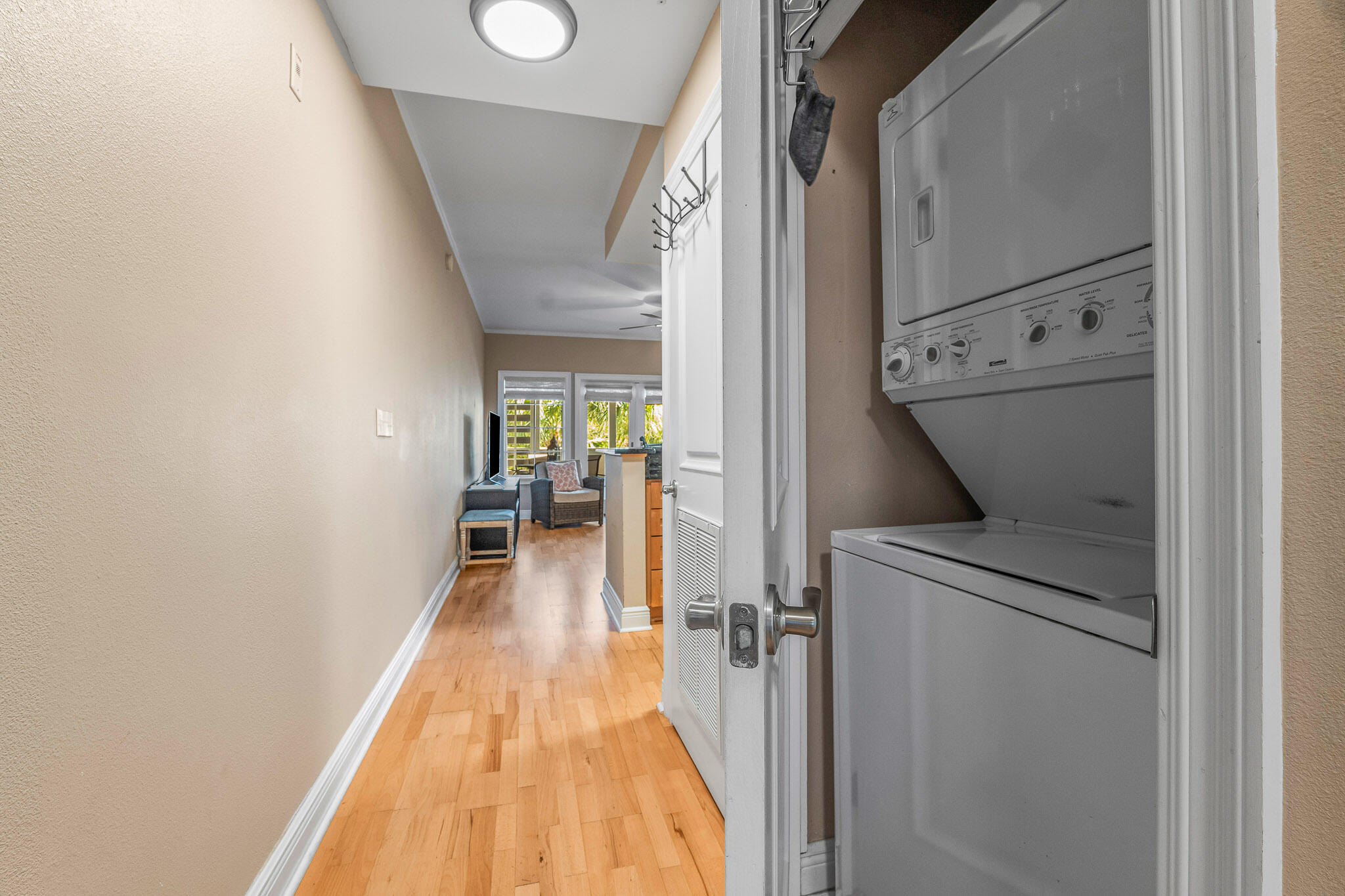 43 Cassine Way, Unit 206 Santa Rosa Beach, FL 32459 - Photo 27 of 32 a view of hallway with wooden floor