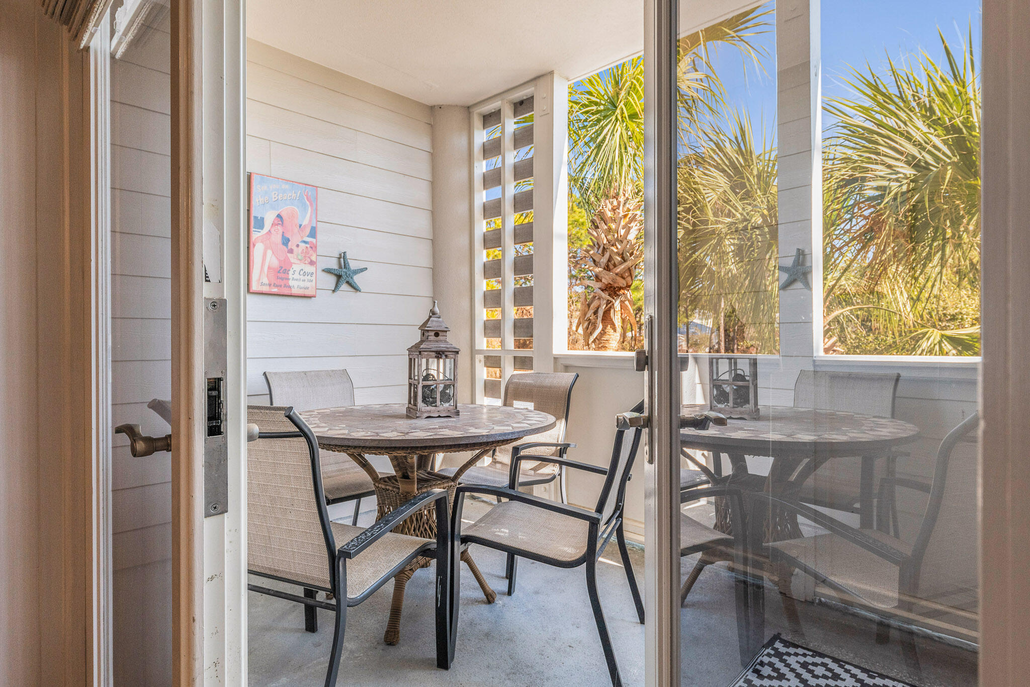 43 Cassine Way, Unit 206 Santa Rosa Beach, FL 32459 - Photo 28 of 32 a view of a dining room with furniture and a window