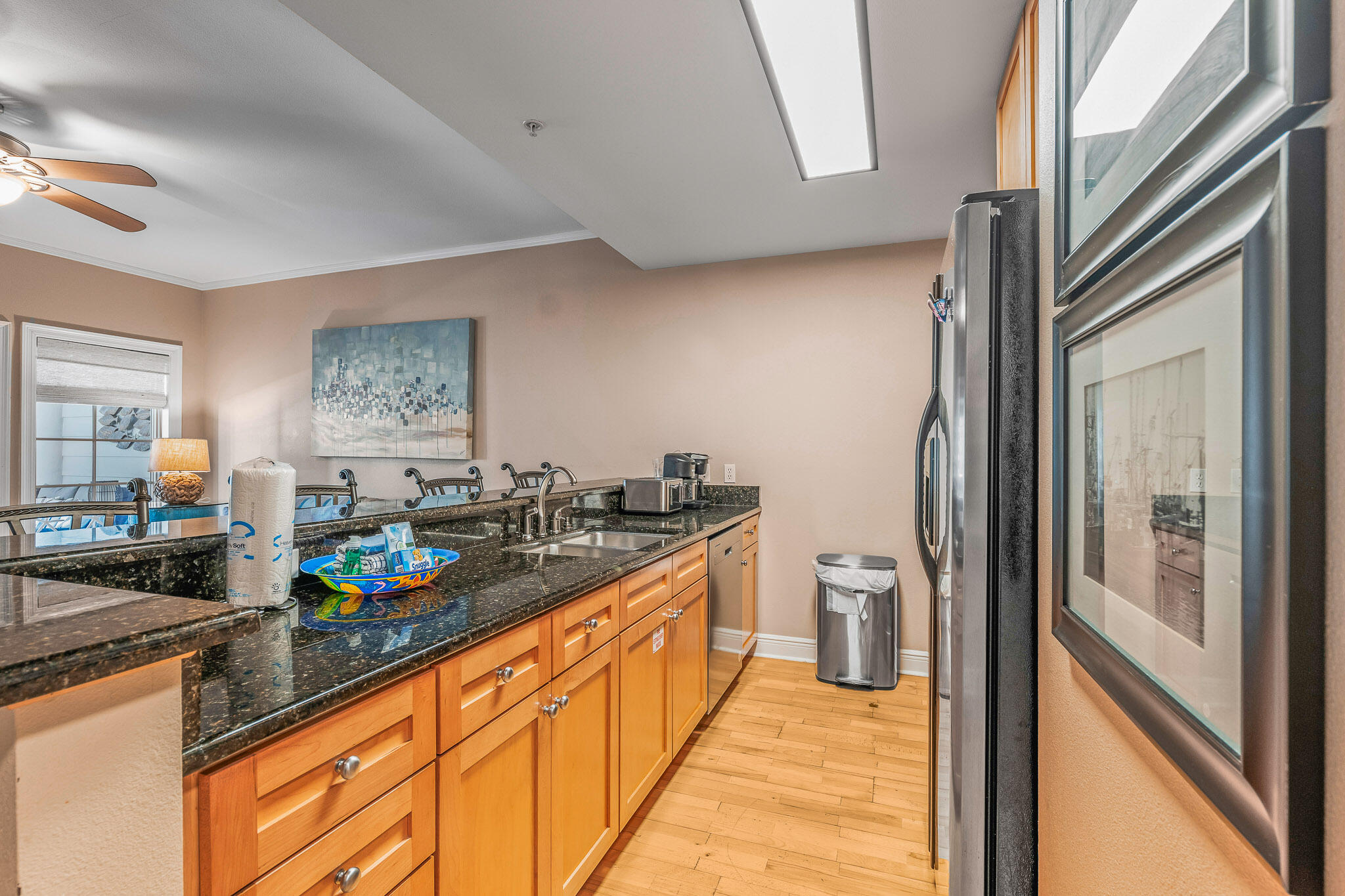 43 Cassine Way, Unit 206 Santa Rosa Beach, FL 32459 - Photo 7 of 32 a large white kitchen with a sink and a large window