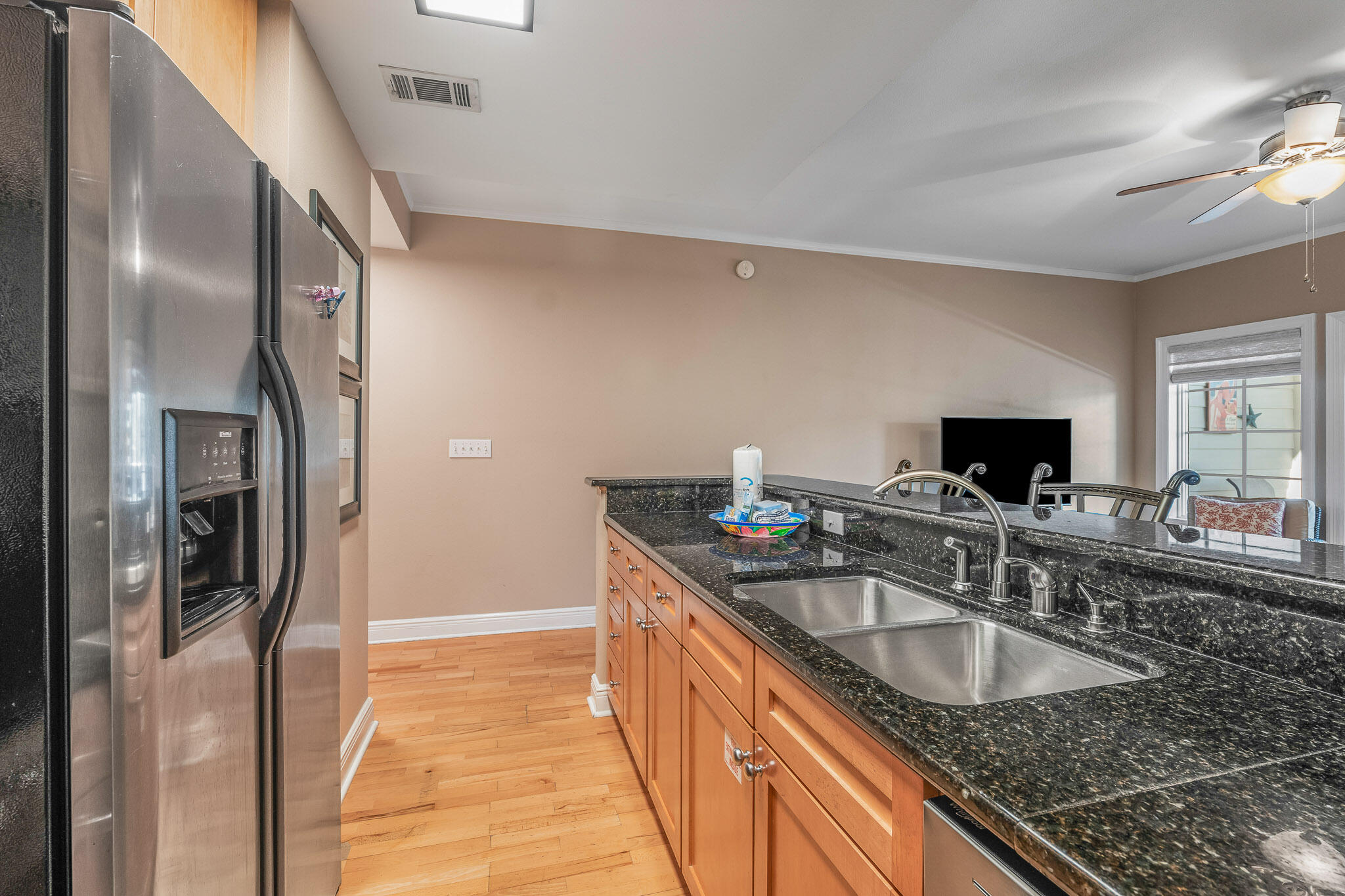 43 Cassine Way, Unit 206 Santa Rosa Beach, FL 32459 - Photo 10 of 32 a kitchen with stainless steel appliances granite countertop a sink stove and refrigerator