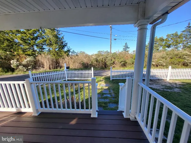 a view of a street from a balcony