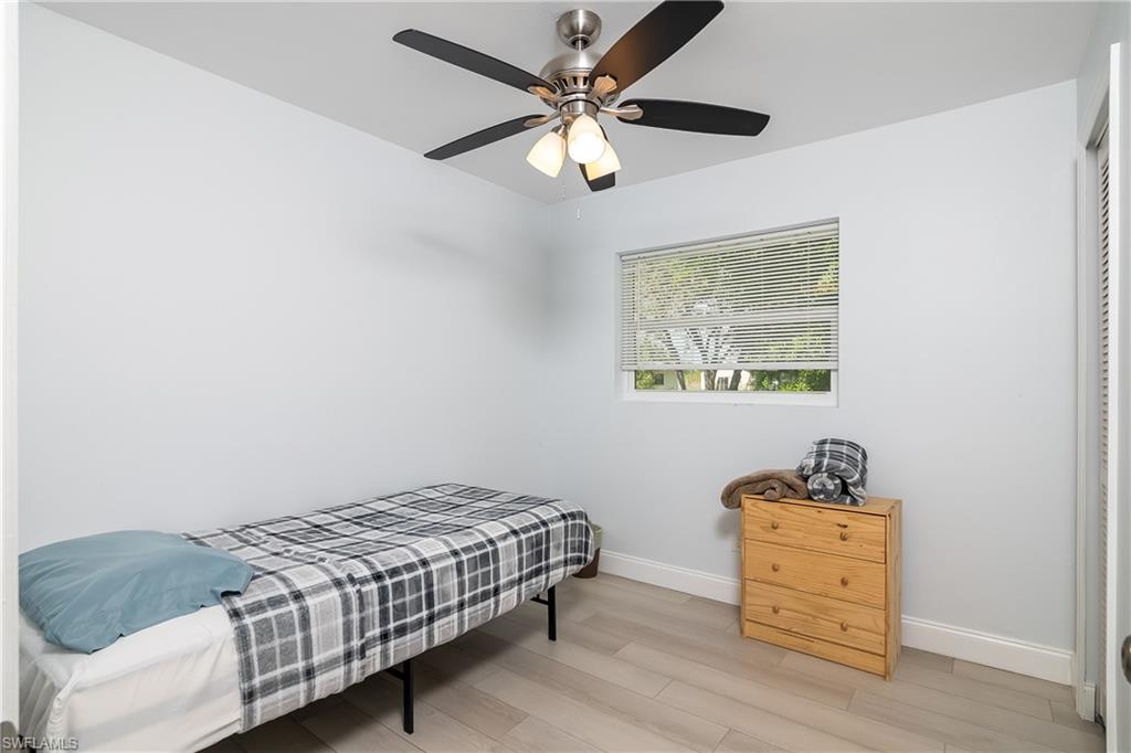 2826 W Road Fort Myers, FL 33905 - Photo 14 of 17 a bedroom with a bed and a window