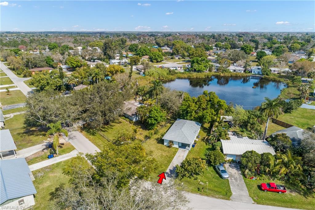 2826 W Road Fort Myers, FL 33905 - Photo 5 of 17 an aerial view of residential houses with outdoor space and trees