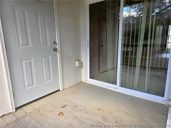 a view of a balcony with a window