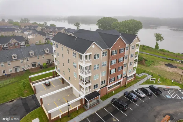an aerial view of a house with outdoor space ocean view