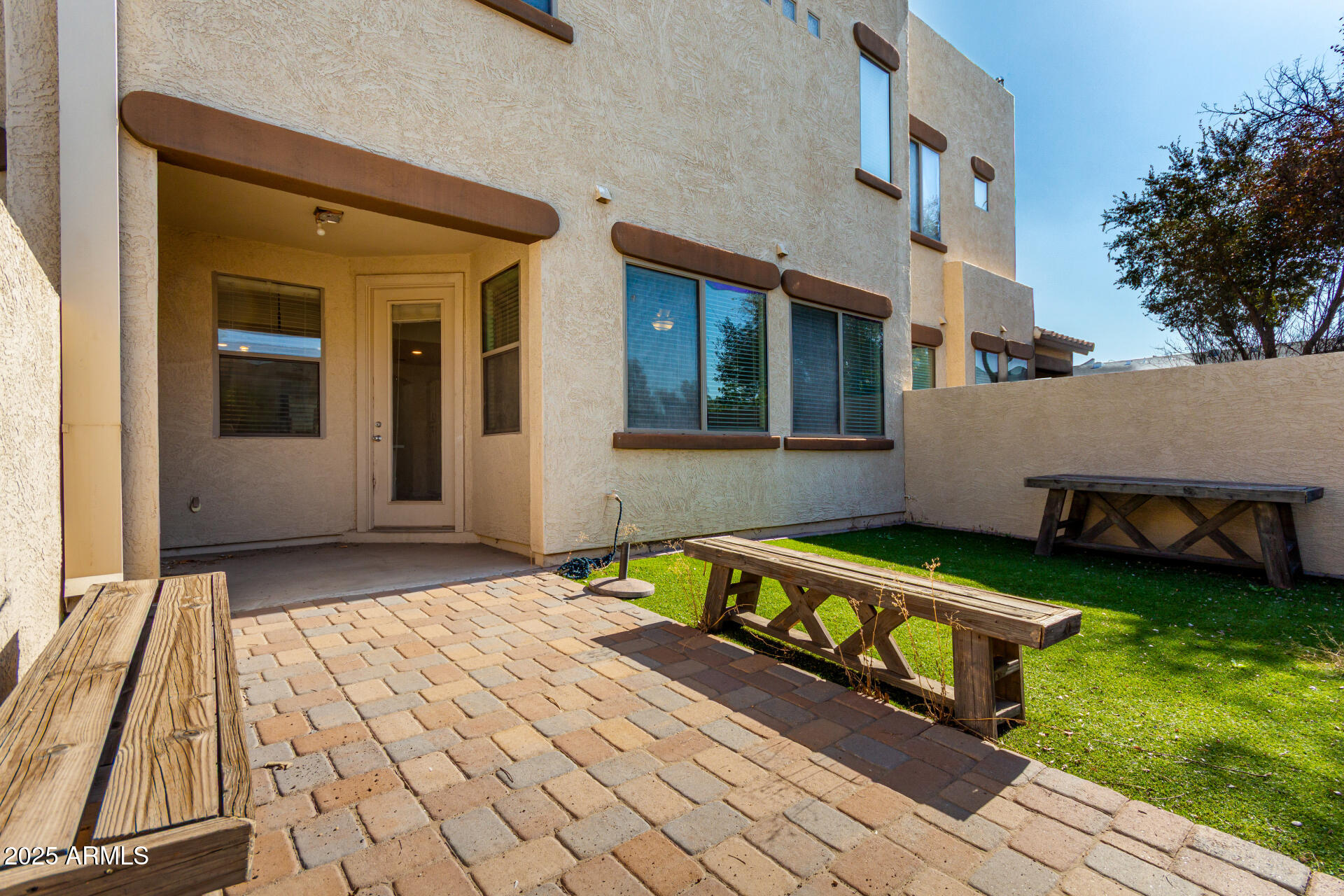 1886 East Don Carlos, Unit 147 Tempe, AZ 85281 - Photo 18 of 22 a front view of house with yard