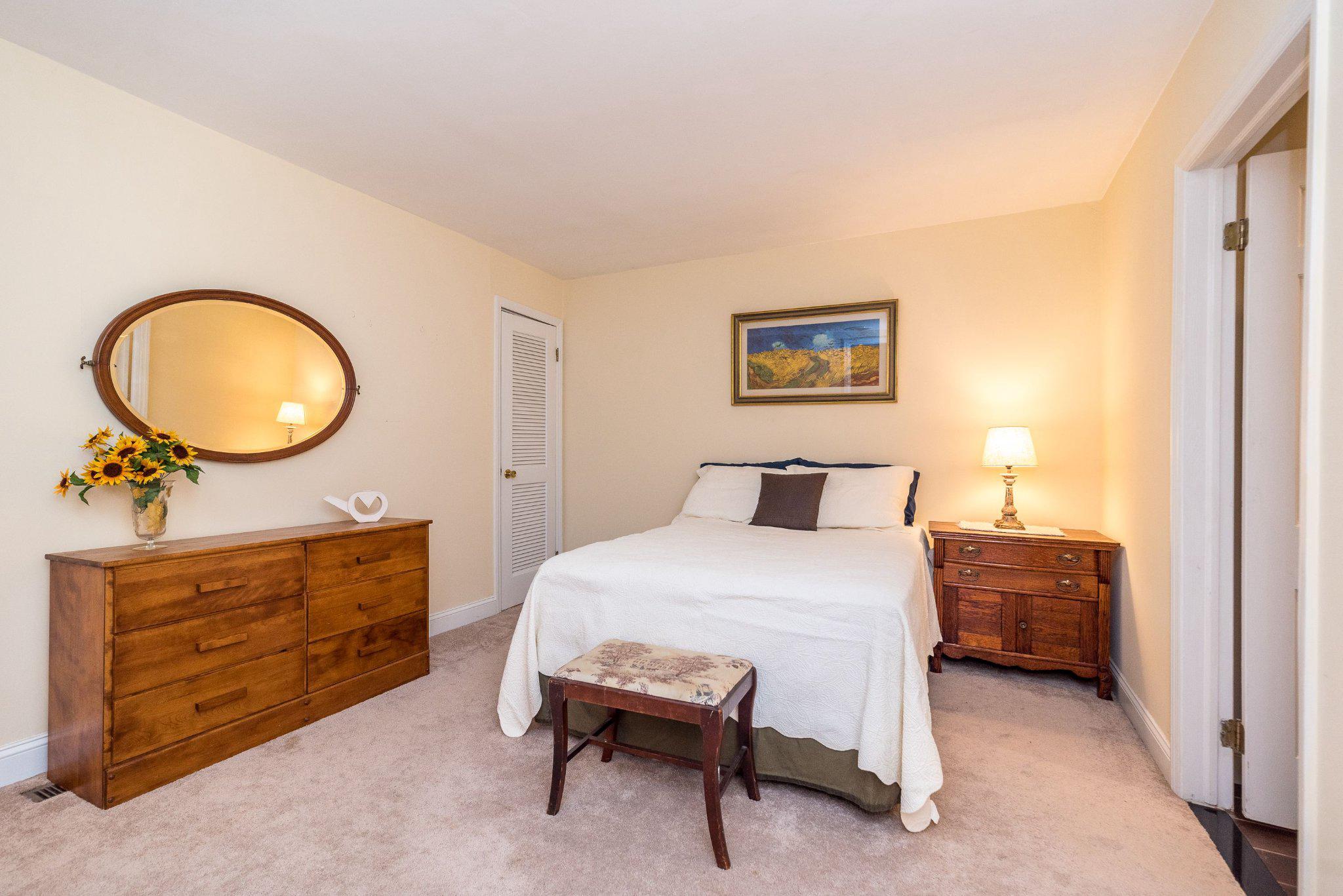 24 Springtree Lane Yardley, PA 19067 - Photo 61 of 84 a bedroom with a bed and a dresser