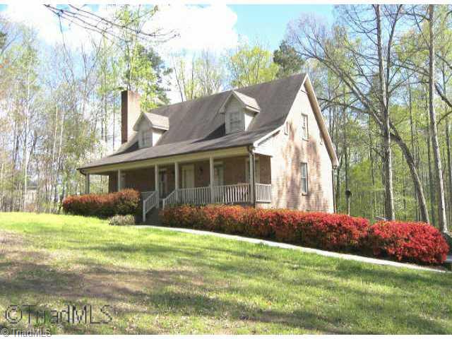 5126 Dock Davis Road Clemmons, NC 27012 - Photo 1 of 9 Exterior Front. Surrounded by azaleas and pleasant woods