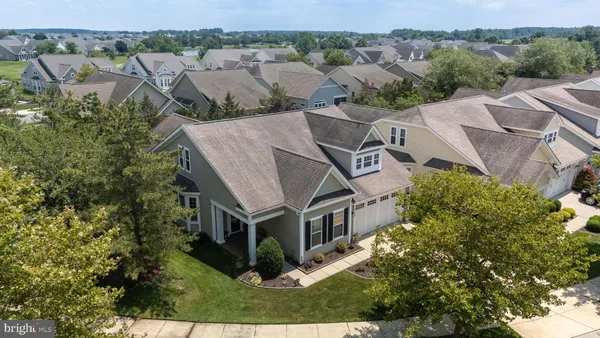 an aerial view of a house with a garden