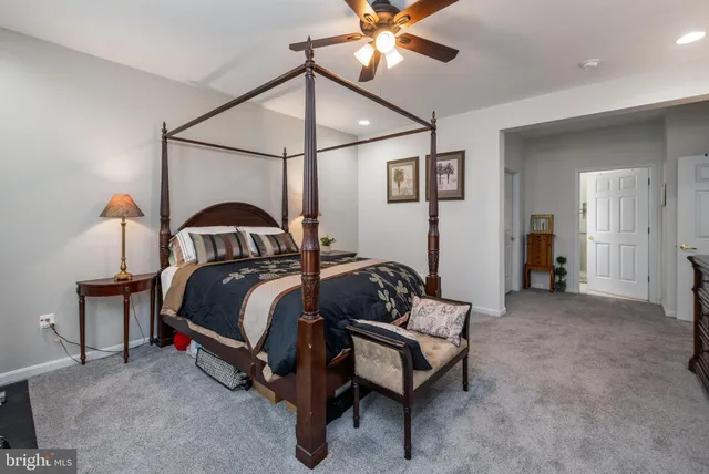 a bathroom with a sink vanity and mirror