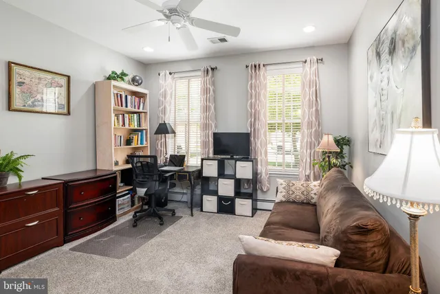 a workspace with furniture and window