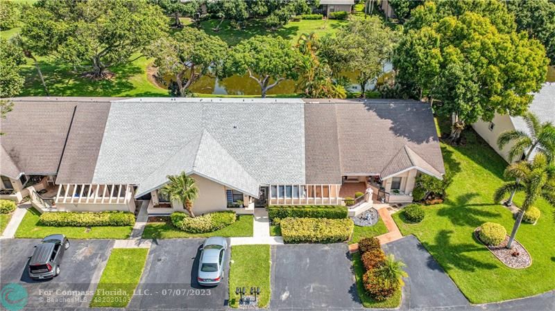 10999 Water Oak Manor Boca Raton, FL 33498 - Photo 2 of 49 an aerial view of a house with yard swimming pool and outdoor seating