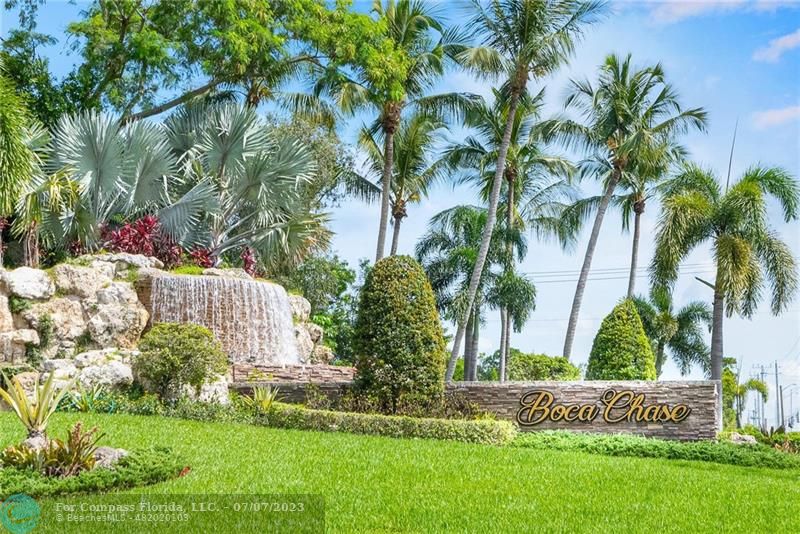 10999 Water Oak Manor Boca Raton, FL 33498 - Photo 3 of 49 a view of a house with a yard and plants
