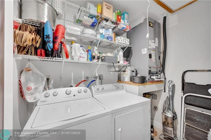 10999 Water Oak Manor Boca Raton, FL 33498 - Photo 33 of 49 a utility room with dryer and washer