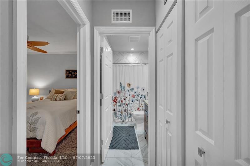 10999 Water Oak Manor Boca Raton, FL 33498 - Photo 38 of 49 a view of a bedroom from a hallway