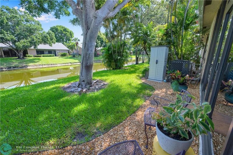 10999 Water Oak Manor Boca Raton, FL 33498 - Photo 43 of 49 a view of a garden with large trees