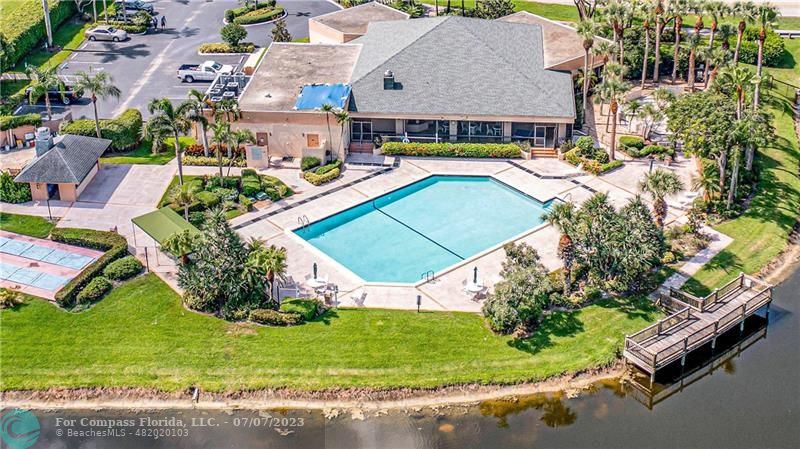 10999 Water Oak Manor Boca Raton, FL 33498 - Photo 47 of 49 an aerial view of a house with a garden and swimming pool