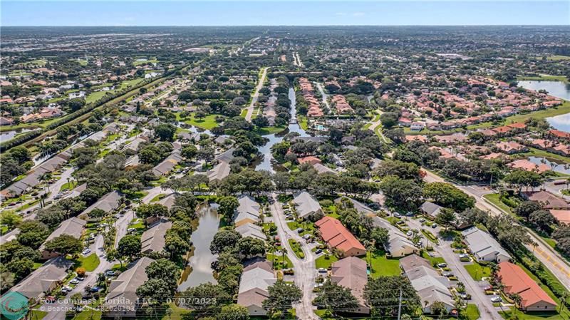 10999 Water Oak Manor Boca Raton, FL 33498 - Photo 48 of 49 an aerial view of multiple house