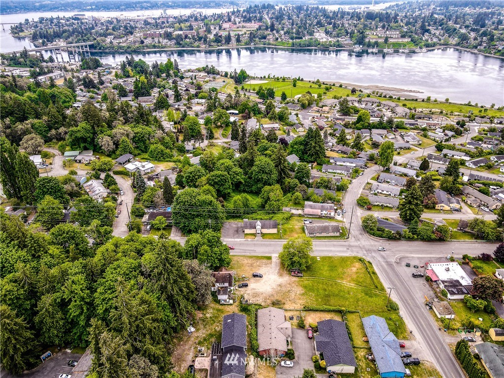 2734 Pine Road Northeast Bremerton, WA 98310 - Photo 17 of 17 an aerial view of residential houses with outdoor space and swimming pool