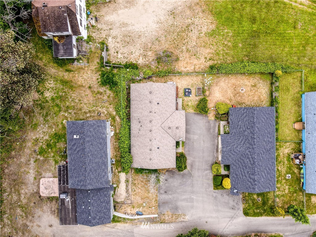 2734 Pine Road Northeast Bremerton, WA 98310 - Photo 5 of 17 an aerial view of a house with a garden