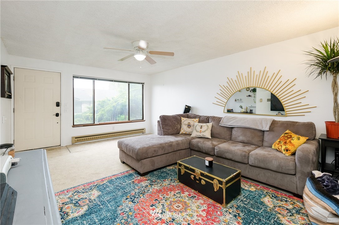 2734 Pine Road Northeast Bremerton, WA 98310 - Photo 7 of 17 a living room with furniture and a large window
