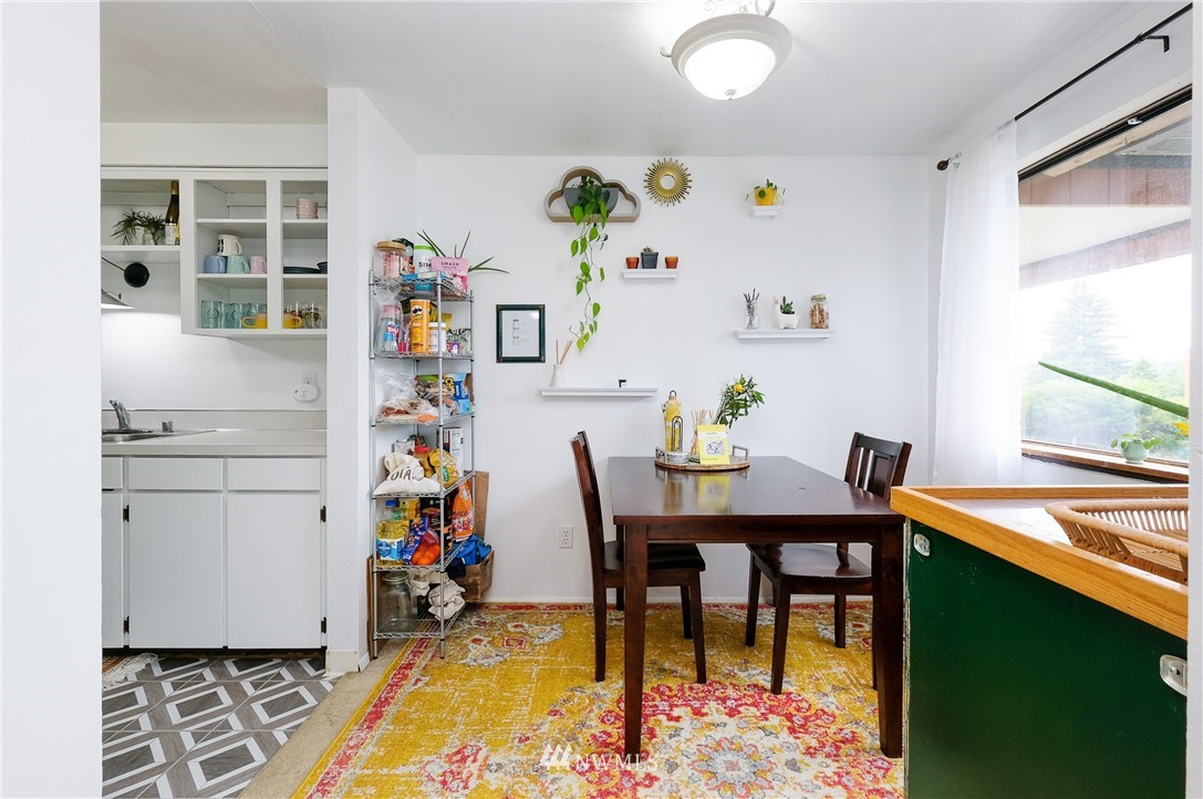 2734 Pine Road Northeast Bremerton, WA 98310 - Photo 8 of 17 a dining room filled a table and chairs