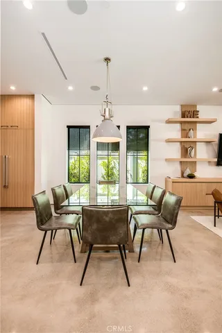 a view of a living room and dining room