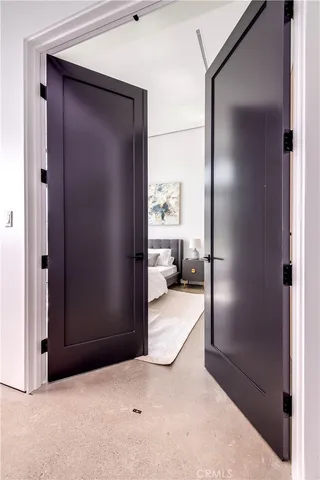 a bathroom with a double vanity sink toilet and shower