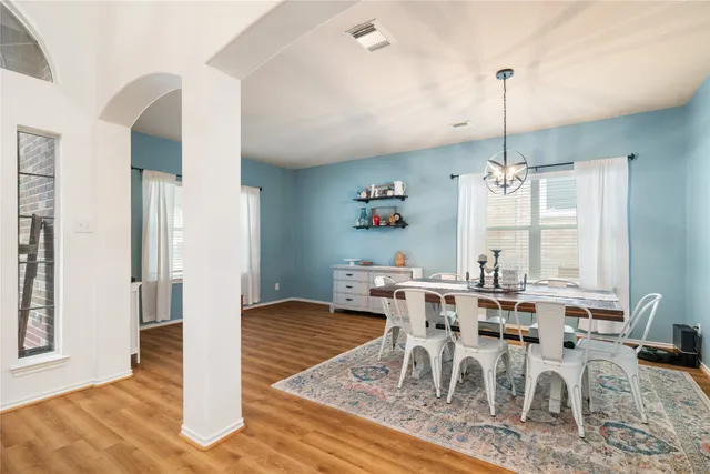 a view of a dining room with furniture