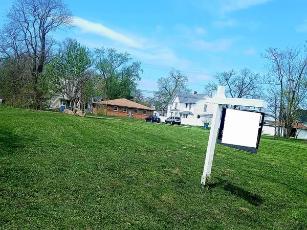 a view of a house with a park