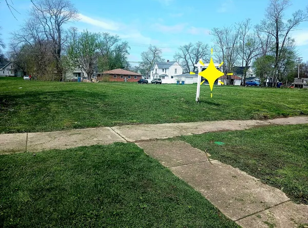 a view of a park with a slide