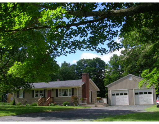 94 Gilbert Road Southampton, MA 01073 - Photo 1 of 1 a front view of a house with a garden