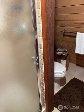 a living room with furniture and flat screen tv