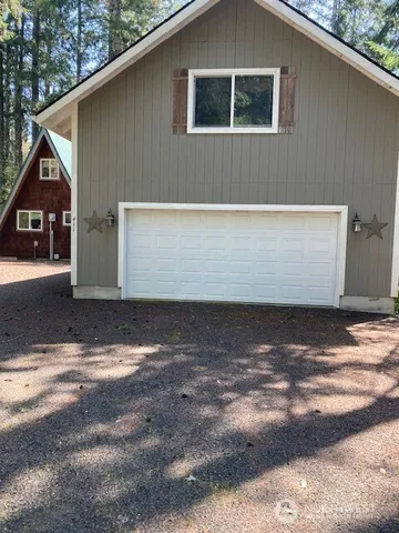 a view of backyard of house