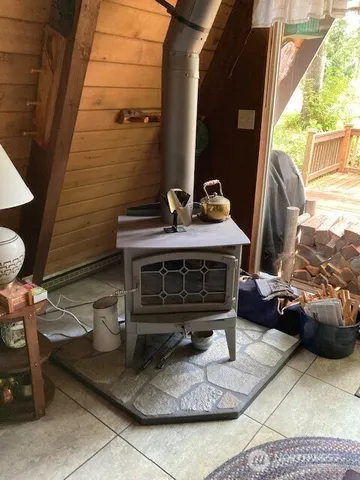 a kitchen with stainless steel appliances a stove a sink and a microwave