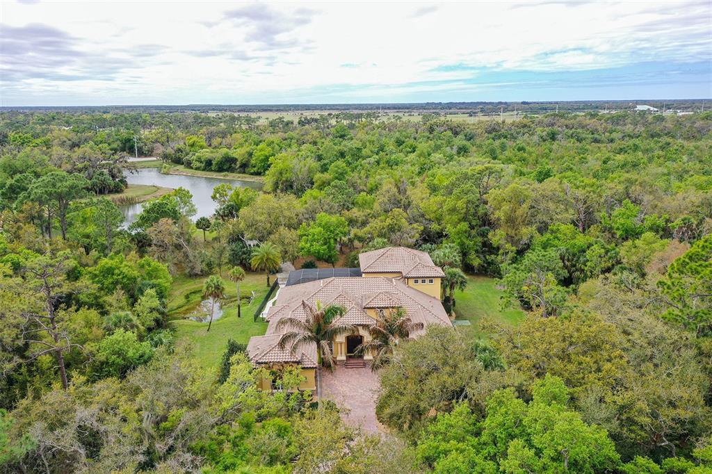 9489 Swaying Branch Road Sarasota, FL 34241 - Photo 3 of 37 a view of a city