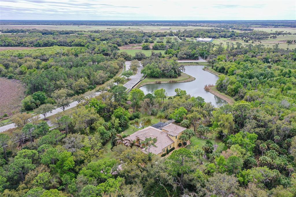 9489 Swaying Branch Road Sarasota, FL 34241 - Photo 34 of 37 an aerial view of a city