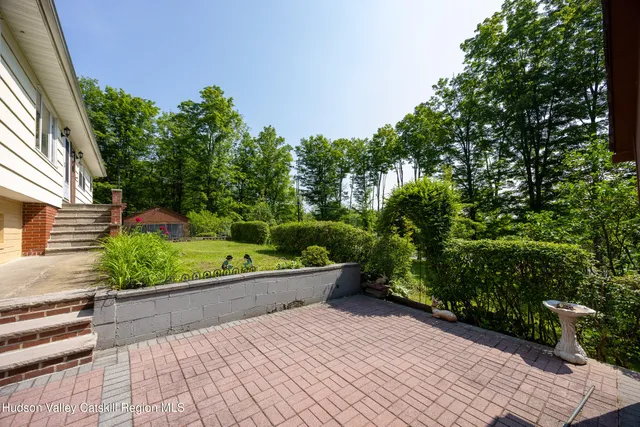 a view of a garden with potted plants