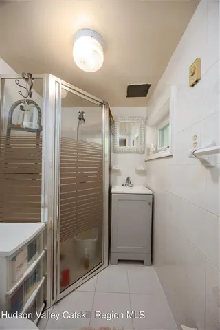 a kitchen with a sink stove and refrigerator