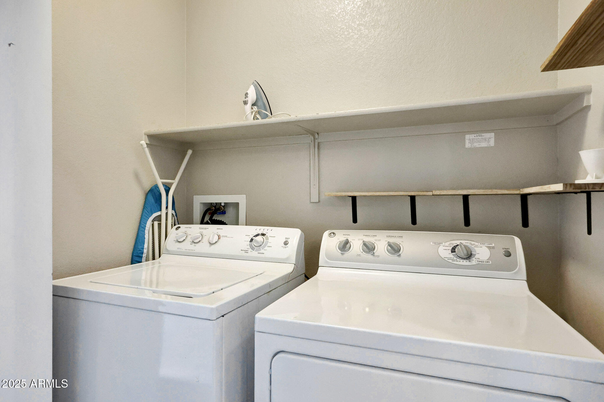 6605 North 93RD Avenue, Unit 1067 Glendale, AZ 85305 - Photo 23 of 47 a utility room with dryer and washer