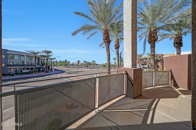 a view of a livingroom with furniture and a window