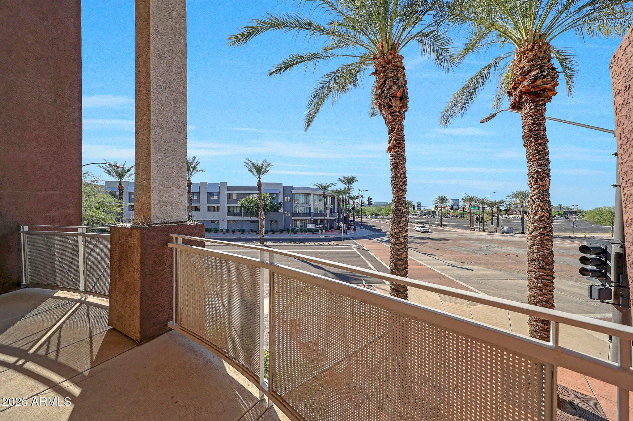 6605 North 93RD Avenue, Unit 1067 Glendale, AZ 85305 - Photo 31 of 47 a view of a balcony with an ocean view