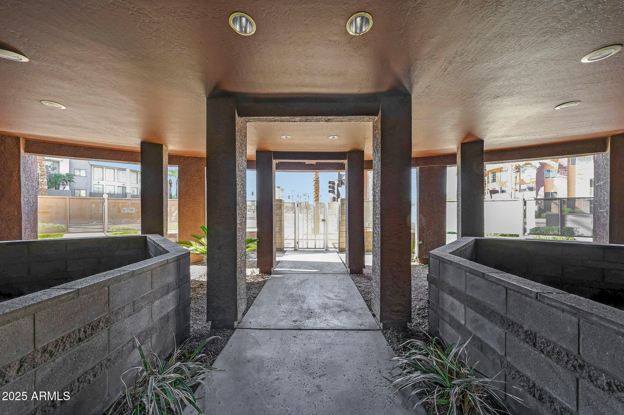 6605 North 93RD Avenue, Unit 1067 Glendale, AZ 85305 - Photo 33 of 47 a living room with furniture and a large window