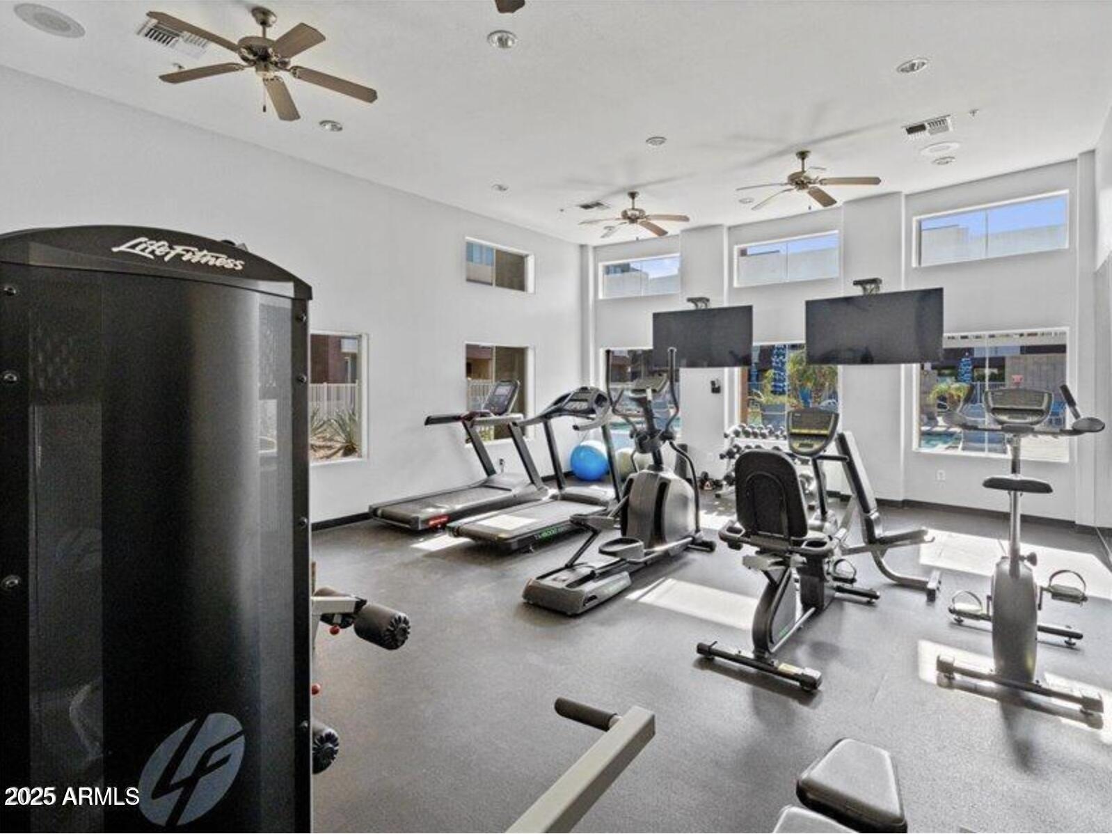 6605 North 93RD Avenue, Unit 1067 Glendale, AZ 85305 - Photo 38 of 47 a view of a kitchen with gym equipment